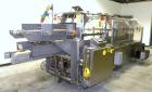 Used Adco Automatic Wraparound Carton Sleever, Model 12WA-125-33. Capable of speeds up to 125 cpm. Fully automatic multipack system for packaging beverage bottles, cans, cups, tubs, trays up to 125 s...