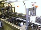 Used Adco Automatic Wraparound Carton Sleever, Model 12WA-125-33. Capable of speeds up to 125 cpm. Fully automatic multipack system for packaging beverage bottles, cans, cups, tubs, trays up to 125 s...