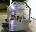 Used Adco Automatic Wraparound Carton Sleever, Model 12WA-125-33, capable of speeds up to 125 cpm.  Fully automatic multipack system for packaging beverage bottles, cans, cups, tubs, trays up to 125 ...