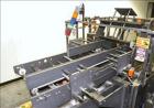 Used Adco Automatic Wraparound Carton Sleever, Model 12WA-125-33, capable of speeds up to 125 cpm.  Fully automatic multipack system for packaging beverage bottles, cans, cups, tubs, trays up to 125 ...