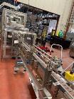 Used Adco 12WM-160-SS Automatic High Speed Wraparound Sleeve Cartoner