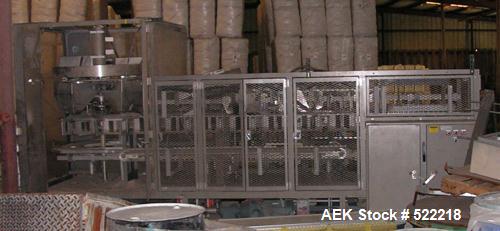 USED: Triangle model VCL1500 continuous motion vertical cartoner equipped with sift proof glue system which includes two Nordson 3800 glue tanks and a Nordson PC50 pattern controller, three head rota...