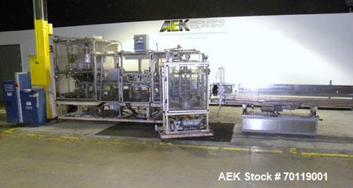 Used Yeaman Machine VCM-1000 Vertical Cartoner with 6 head volumetric cup fille