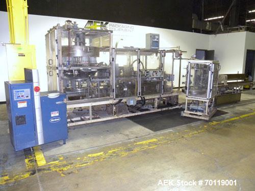 Used- Yeaman Machine VCM-1000 Vertical Cartoner with 6 head volumetric cup fille