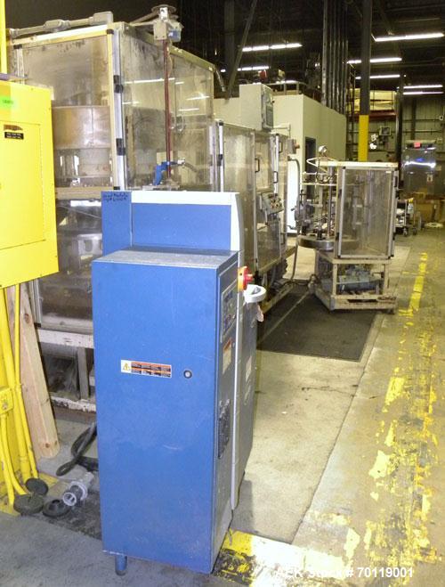 Used Yeaman Machine VCM-1000 Vertical Cartoner with 6 head volumetric cup fille