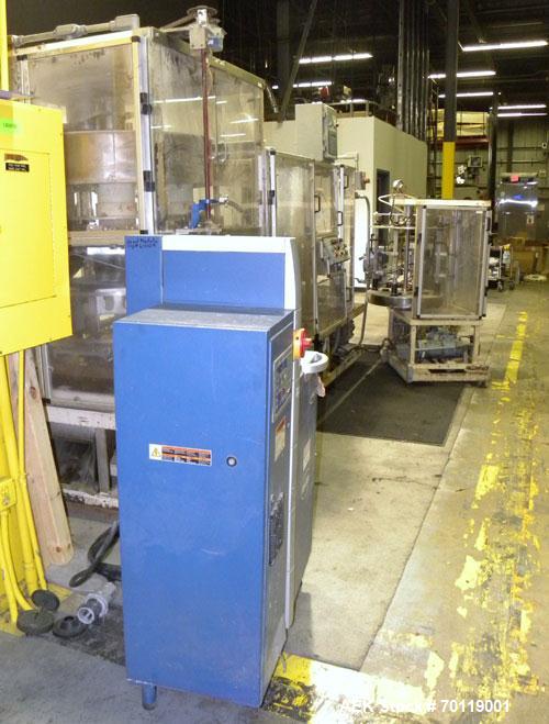 Used- Yeaman Machine VCM-1000 Vertical Cartoner with 6 head volumetric cup fille