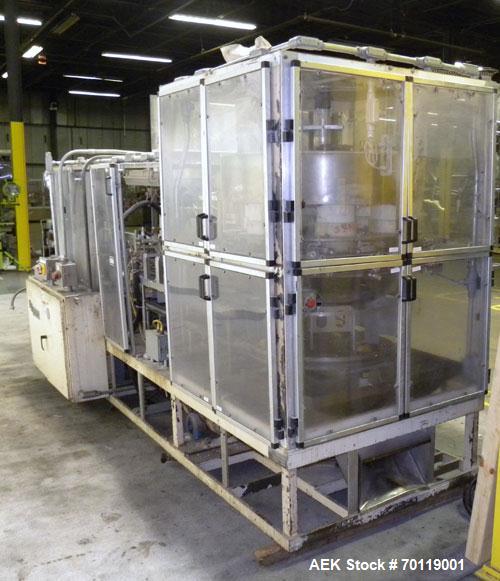 Used Yeaman Machine VCM-1000 Vertical Cartoner with 6 head volumetric cup fille