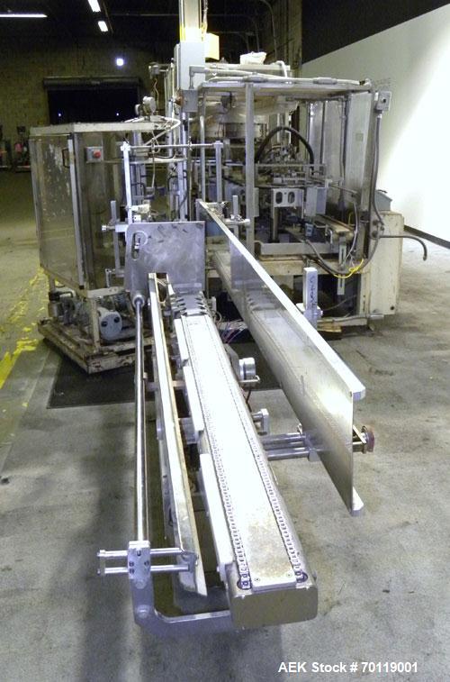 Used Yeaman Machine VCM-1000 Vertical Cartoner with 6 head volumetric cup fille