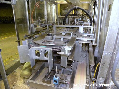 Used Yeaman Machine VCM-1000 Vertical Cartoner with 6 head volumetric cup fille