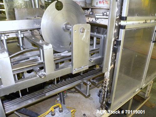 Used Yeaman Machine VCM-1000 Vertical Cartoner with 6 head volumetric cup fille