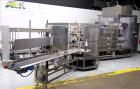 Used- Triangle Continuous Motion Vertical Cartoner, Model VCL-1500