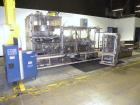 Used Yeaman Machine VCM-1000 Vertical Cartoner with 6 head volumetric cup fille