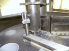 Used Yeaman Machine VCM-1000 Vertical Cartoner with 6 head volumetric cup fille