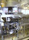 Used Yeaman Machine VCM-1000 Vertical Cartoner with 6 head volumetric cup fille
