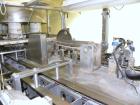Used Yeaman Machine VCM-1000 Vertical Cartoner with 6 head volumetric cup fille