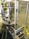 Used Yeaman Machine VCM-1000 Vertical Cartoner with 6 head volumetric cup fille