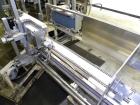 Used Yeaman Machine VCM-1000 Vertical Cartoner with 6 head volumetric cup fille