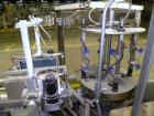Used Yeaman Machine VCM-1000 Vertical Cartoner with 6 head volumetric cup fille
