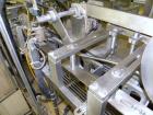 Used Yeaman Machine VCM-1000 Vertical Cartoner with 6 head volumetric cup fille