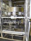 Used- Yeaman Machine VCM-1000 Vertical Cartoner with 6 head volumetric cup fille