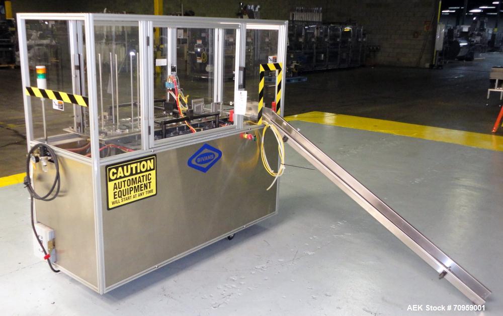 Used Bivans 54L Carton Former and Bottom Closer. Capable of speeds up to 60 cartons per minute. Has a carton size range: (Length) 1/2" - 8-7/8", (Width) 3/8"  - 7", (Depth) 1-1/8" - 14-1/16". Set up ...