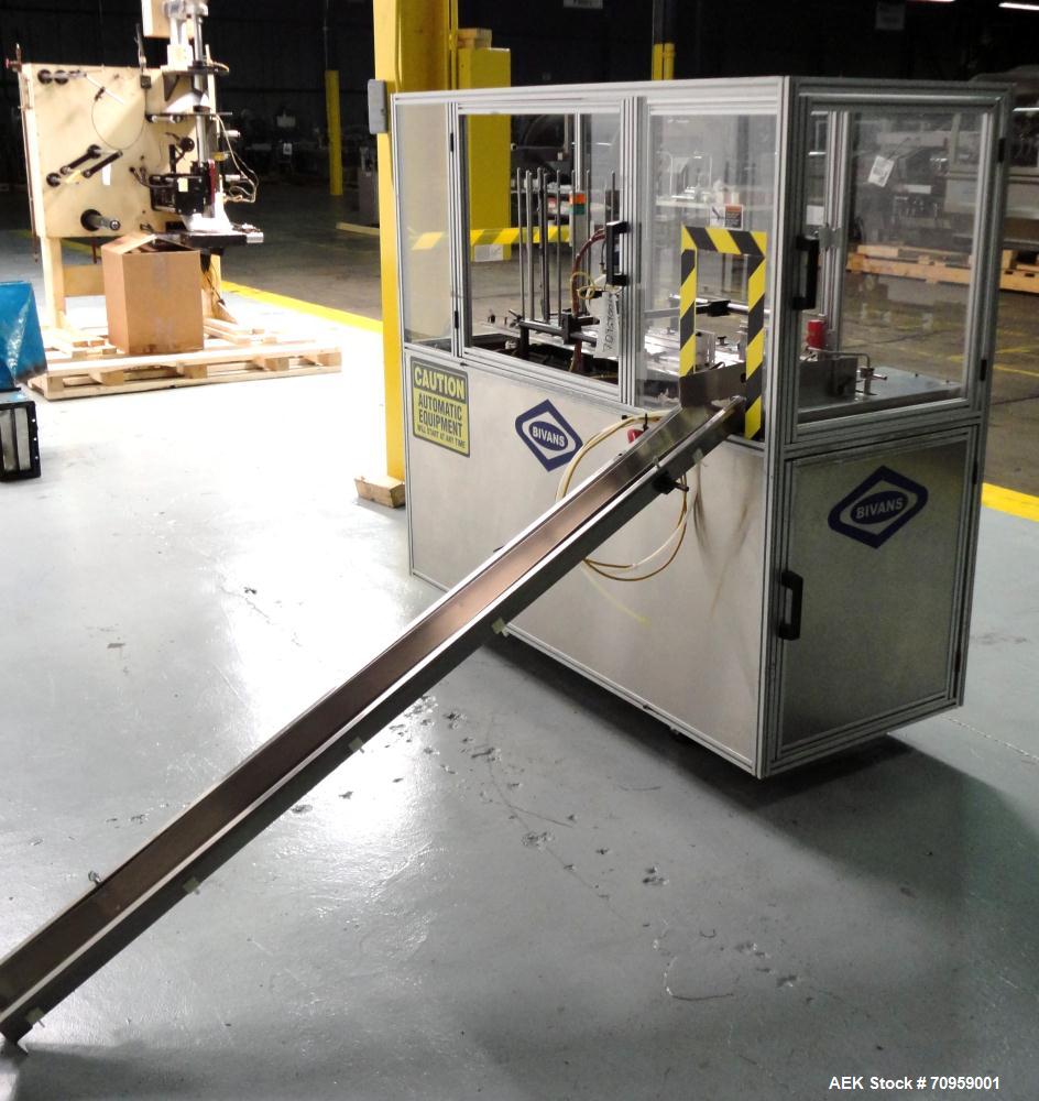 Used Bivans 54L Carton Former and Bottom Closer. Capable of speeds up to 60 cartons per minute. Has a carton size range: (Length) 1/2" - 8-7/8", (Width) 3/8"  - 7", (Depth) 1-1/8" - 14-1/16". Set up ...