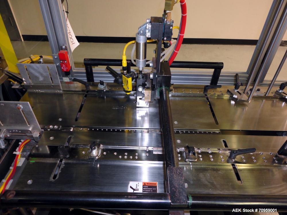 Used Bivans 54L Carton Former and Bottom Closer. Capable of speeds up to 60 cartons per minute. Has a carton size range: (Length) 1/2" - 8-7/8", (Width) 3/8"  - 7", (Depth) 1-1/8" - 14-1/16". Set up ...