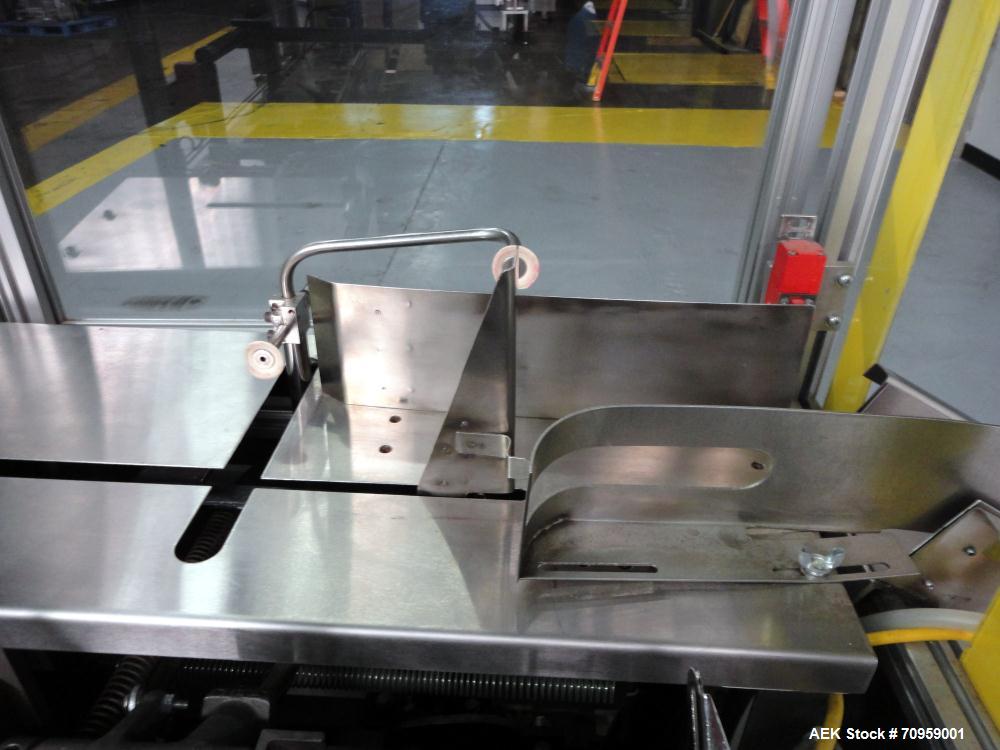 Used Bivans 54L Carton Former and Bottom Closer. Capable of speeds up to 60 cartons per minute. Has a carton size range: (Length) 1/2" - 8-7/8", (Width) 3/8"  - 7", (Depth) 1-1/8" - 14-1/16". Set up ...