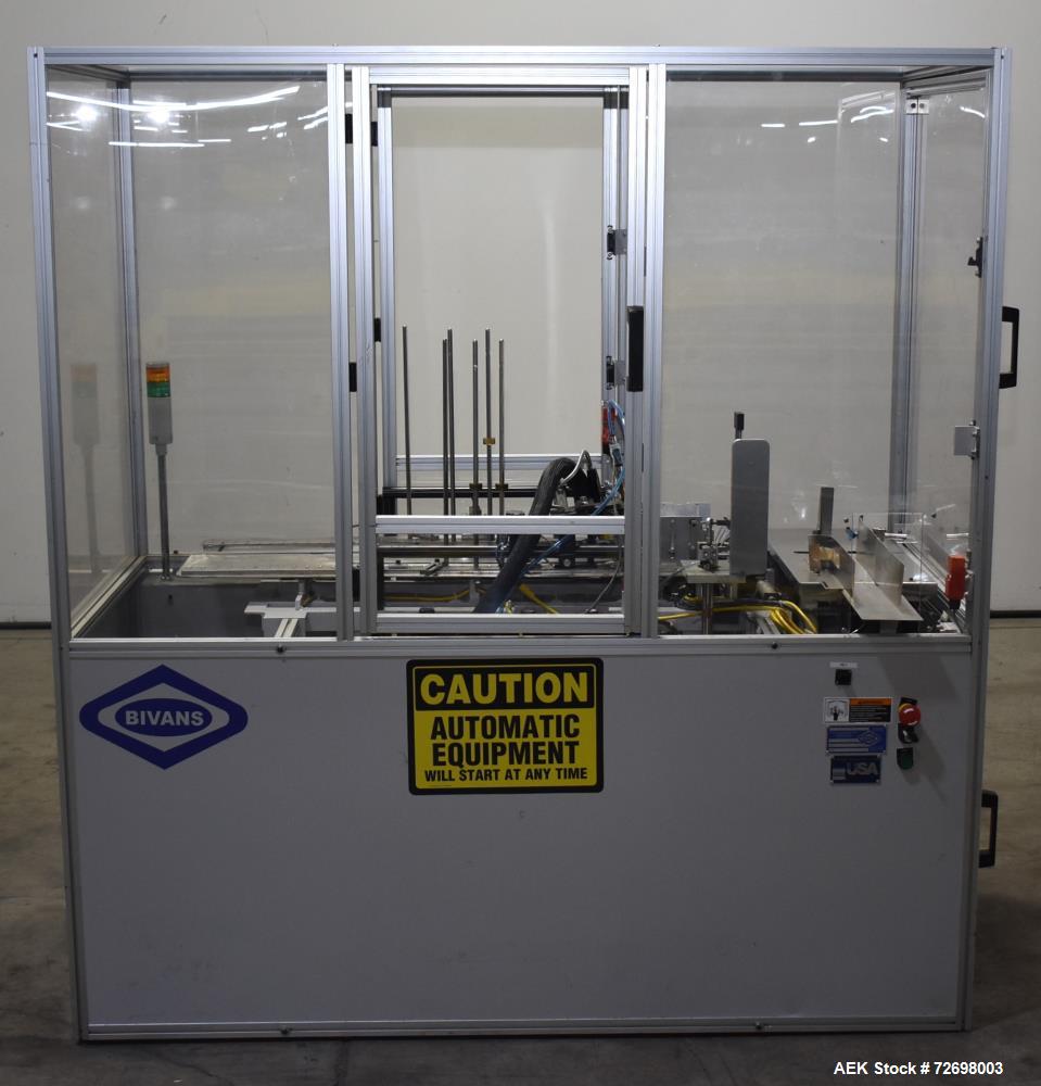 Used- Bivans 54L Carton Former and Bottom Closer. Capable of speeds up to 60 cartons per minute. Has a carton size range: (L...