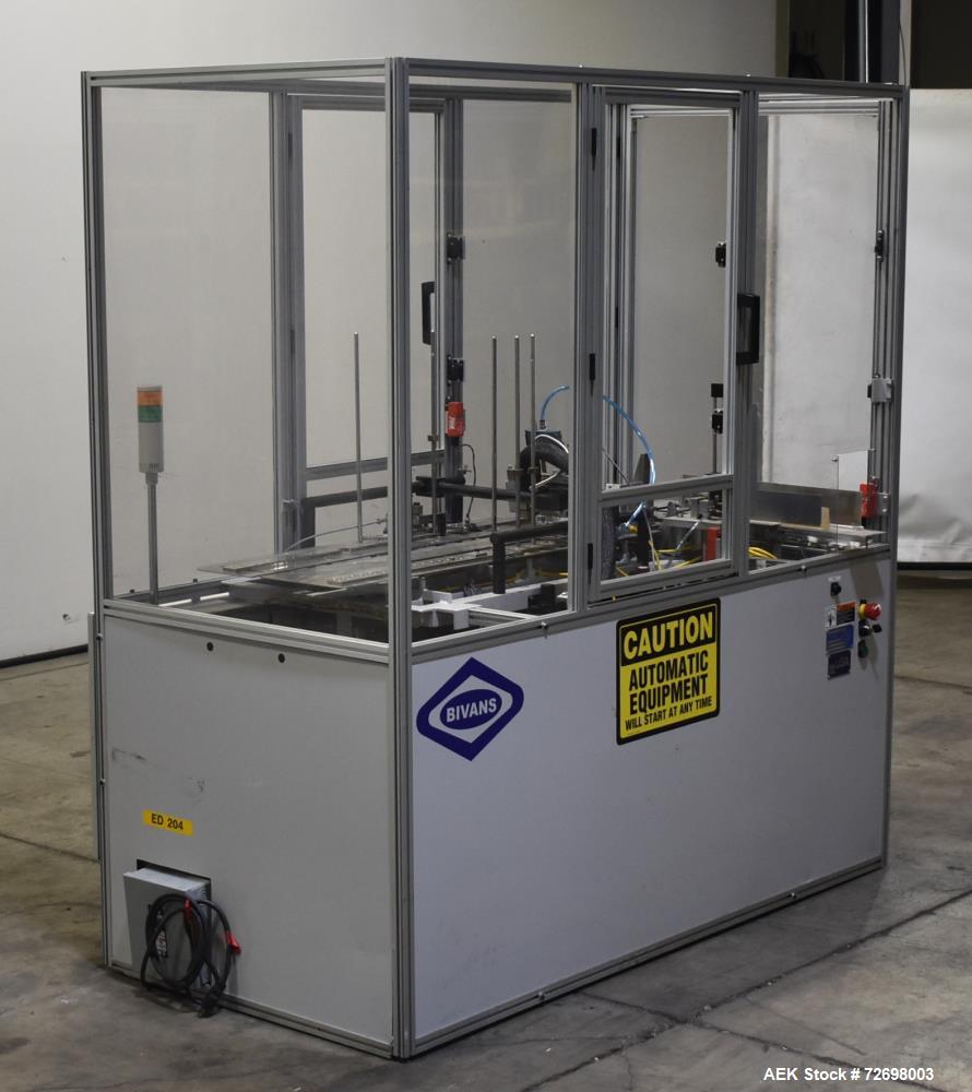 Used- Bivans 54L Carton Former and Bottom Closer. Capable of speeds up to 60 cartons per minute. Has a carton size range: (L...