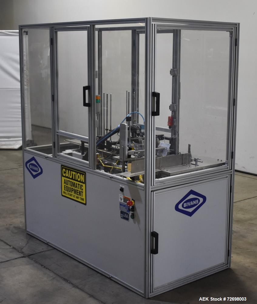 Used- Bivans 54L Carton Former and Bottom Closer. Capable of speeds up to 60 cartons per minute. Has a carton size range: (L...