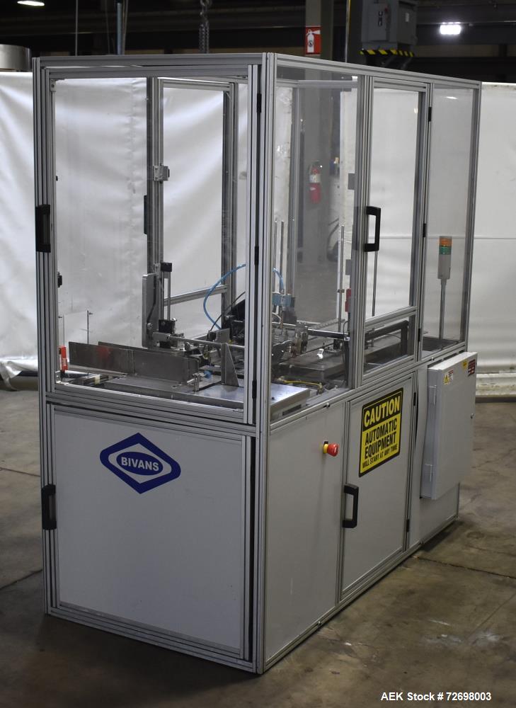 Used- Bivans 54L Carton Former and Bottom Closer. Capable of speeds up to 60 cartons per minute. Has a carton size range: (L...