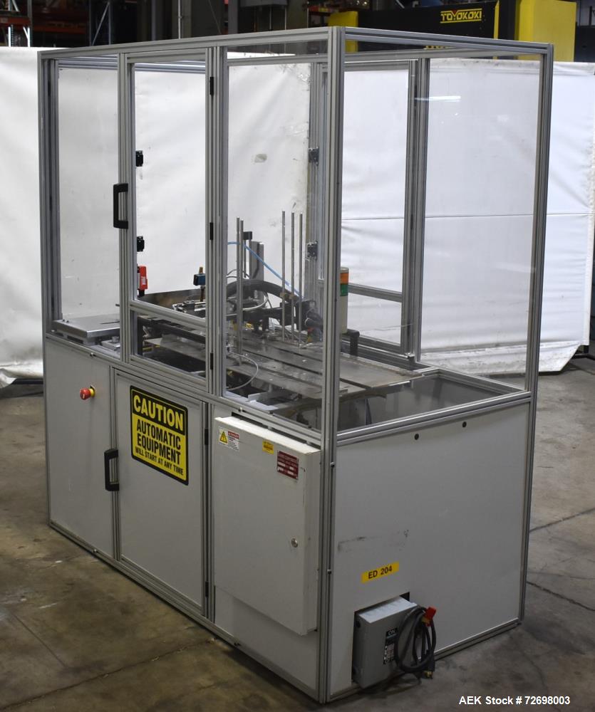 Used- Bivans 54L Carton Former and Bottom Closer. Capable of speeds up to 60 cartons per minute. Has a carton size range: (L...