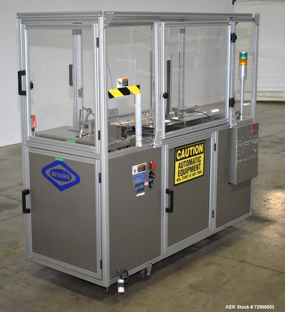 Used Bivans 54L Carton Former and Bottom Closer. Capable of speeds up to 60 cartons per minute. Has a carton size range:  1/2" - 8-7/8" (Length) x  3/8" - 7" (Width) x 1-1/8" - 14-1/16"  (Depth). Set...