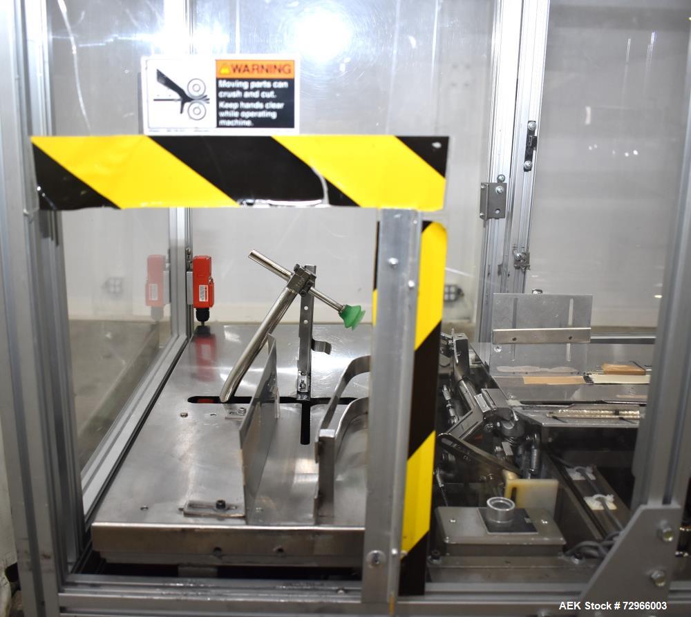 Used Bivans 54L Carton Former and Bottom Closer. Capable of speeds up to 60 cartons per minute. Has a carton size range:  1/2" - 8-7/8" (Length) x  3/8" - 7" (Width) x 1-1/8" - 14-1/16"  (Depth). Set...