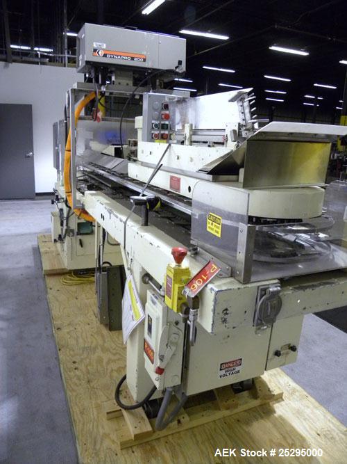 Used- Bivans Vertuck Semi Automatic Vertical Cartoner, Model 74G. Capable of speeds up to 120 CPM. Has 6" centers for a cart...