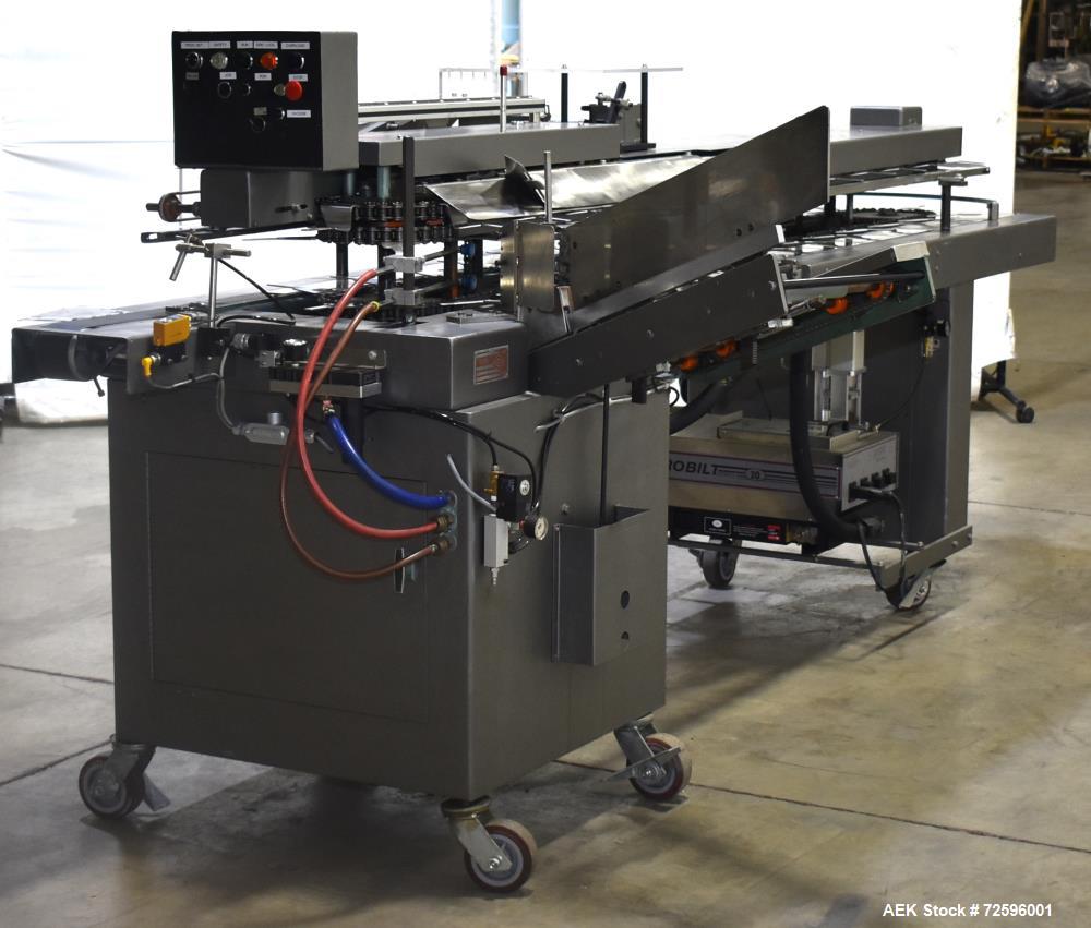 Used Bivans Vertuck Model 74 Semi Automatic Vertical Cartoner. Capable of speeds up to 120 CPM. Has 6" centers for a carton size range: 7/8" - 5" (length) x  3/4" - 3-1/2" (Width) x 2-1/4" - 10" (Dep...