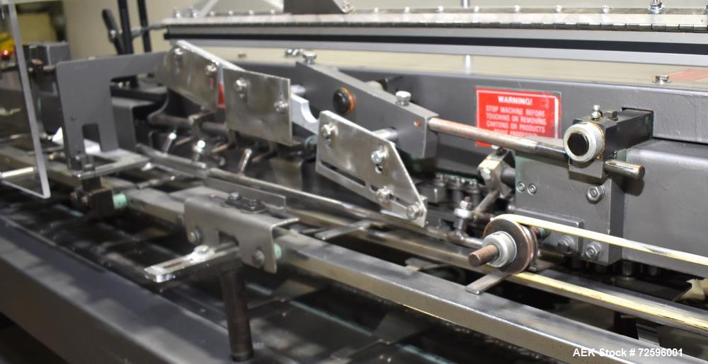 Used- Bivans Vertuck Model 74 Semi Automatic Vertical Cartoner. Capable of speeds up to 120 CPM. Has 6" centers for a carton...