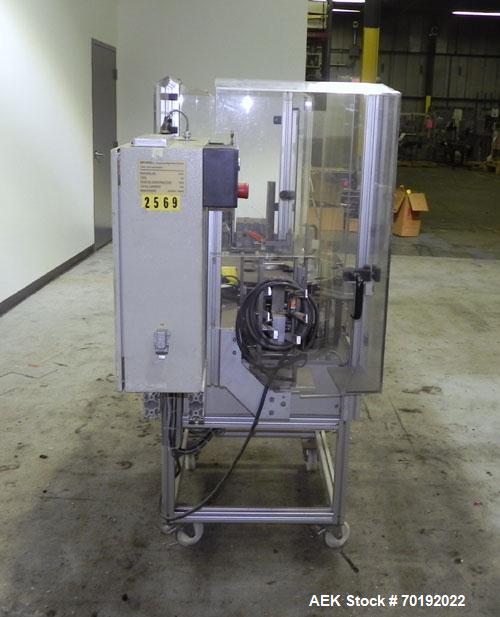 Used Brunner Model VC Reverse Tuck Vertical Intermittent Motion Cartoner.