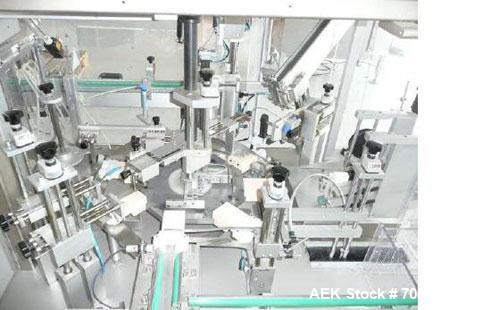 Used CMA Minicompact Vertical Vial Cartoner.  Maximum output 35 cartons/minute, vial diameter 1.8" - 2.6" (46 - 66 mm), vial height 3.2" - 5.6" (83 - 143 mm), carton sizes (LxWxH) 0.8" - 4.7" (20 - 1...