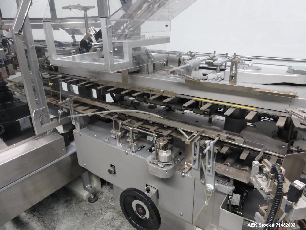 Used- CAM Model AV Vertical Cartoner With Automatic Bottle Loader