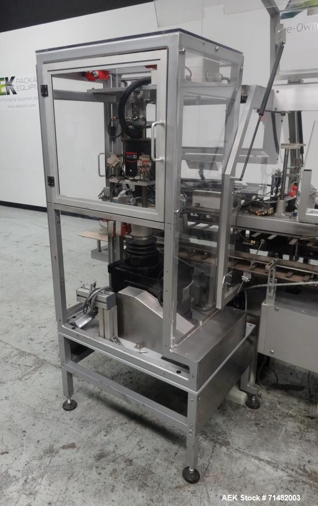 Used- CAM Model AV Vertical Cartoner With Automatic Bottle Loader