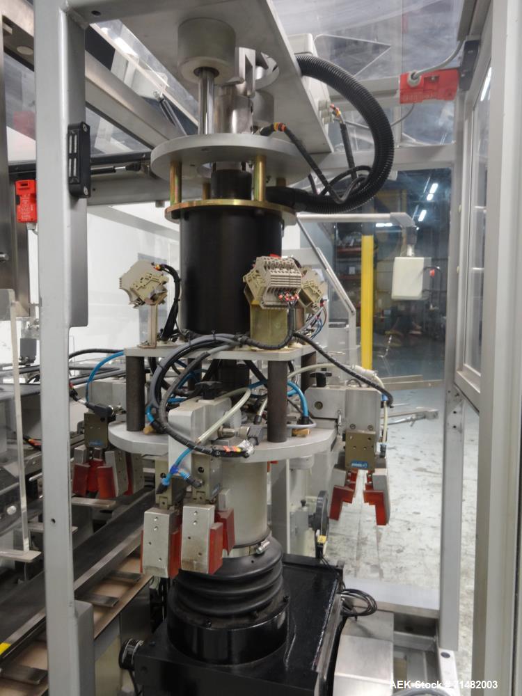 Used CAM Model AV Vertical Cartoner With Automatic Bottle Loader
