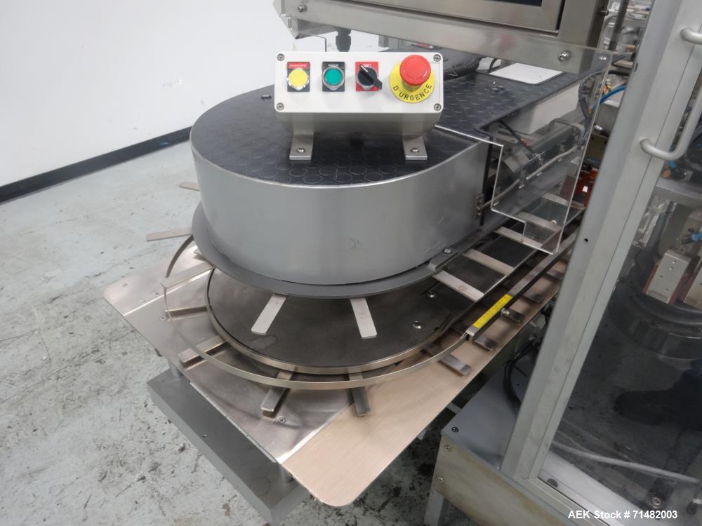 Used CAM Model AV Vertical Cartoner With Automatic Bottle Loader