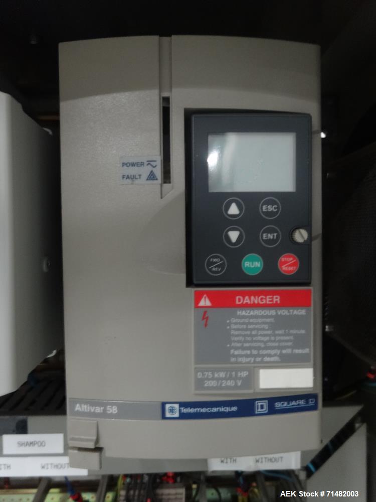 Used- CAM Model AV Vertical Cartoner With Automatic Bottle Loader