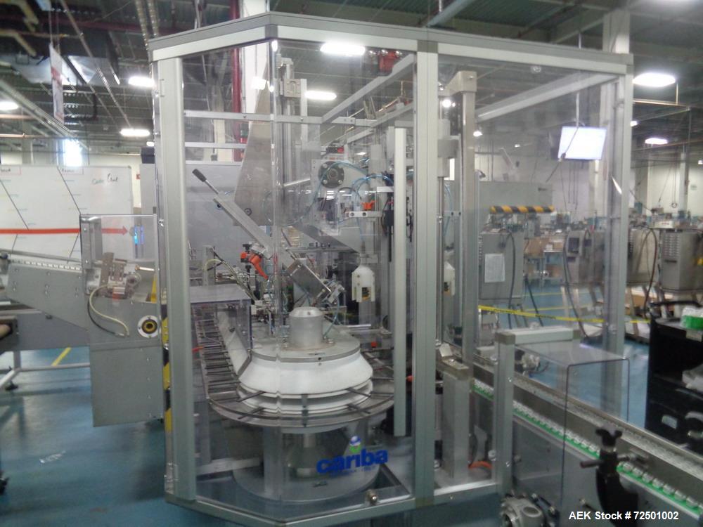 Used Cariba Model C230 Automatic intermittant motion vertical cartoner with robotic loader for bottles/jars. Capable of speeds up to 70 cartons per minute. Carton size range: 25mm - 150mm (length) x ...