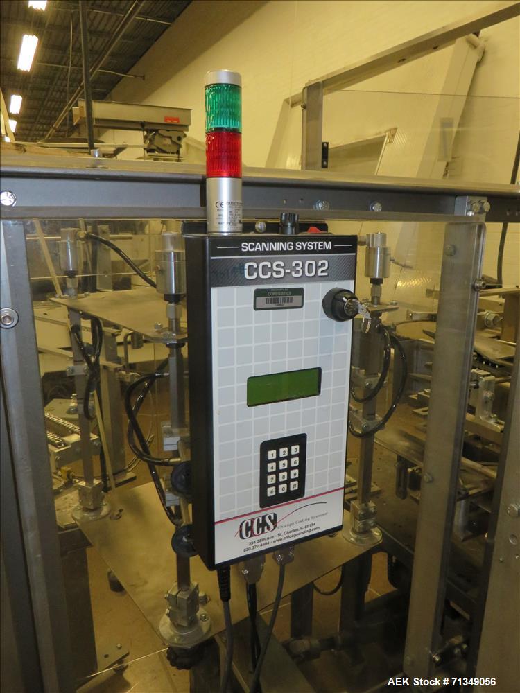Used Clybourn Model CHL7 vertical hand load hot melt glue cartoner. Capable of speeds from 10 to 100 cartons per minute.  Set on 10" centers for a carton  size range: 1" - 8-1/4" length x 3/4" - 3-1/...