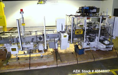 Used Jones Oystar Semi Automatic Vertical Cartoner, Model CMV. Capable of speeds up to 120 rpm. Has 5" centers for a carton size range: length 1" to 4-1/4", width 3/4" to 4-1/4", depth 2-1/8" to 8". ...