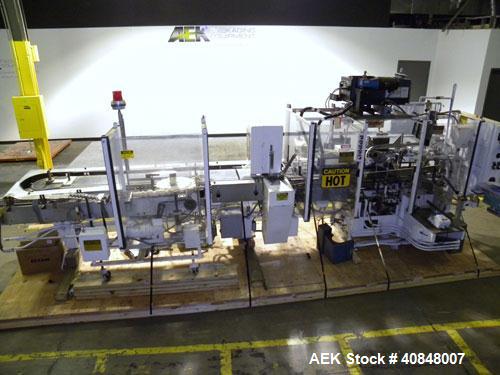Used Jones Oystar Semi Automatic Vertical Cartoner, Model CMV. Capable of speeds up to 120 rpm. Has 5" centers for a carton size range: length 1" to 4-1/4", width 3/4" to 4-1/4", depth 2-1/8" to 8". ...
