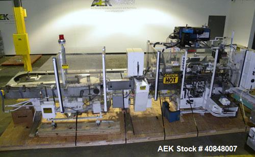 Used Jones Oystar Semi Automatic Vertical Cartoner, Model CMV. Capable of speeds up to 120 rpm. Has 5" centers for a carton size range: length 1" to 4-1/4", width 3/4" to 4-1/4", depth 2-1/8" to 8". ...